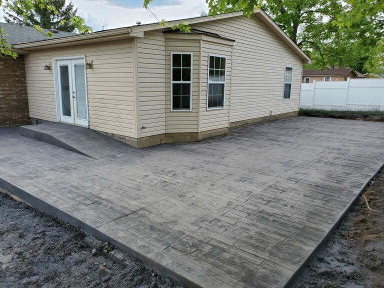 Residential concrete patio with stamped plank design